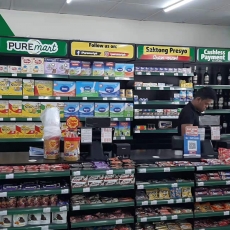 CHECK OUT COUNTER WITH BLACK WALL